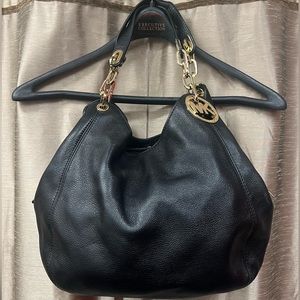 Black leather Michael Kors shoulder bag gold hardware a gold-tone chain strap